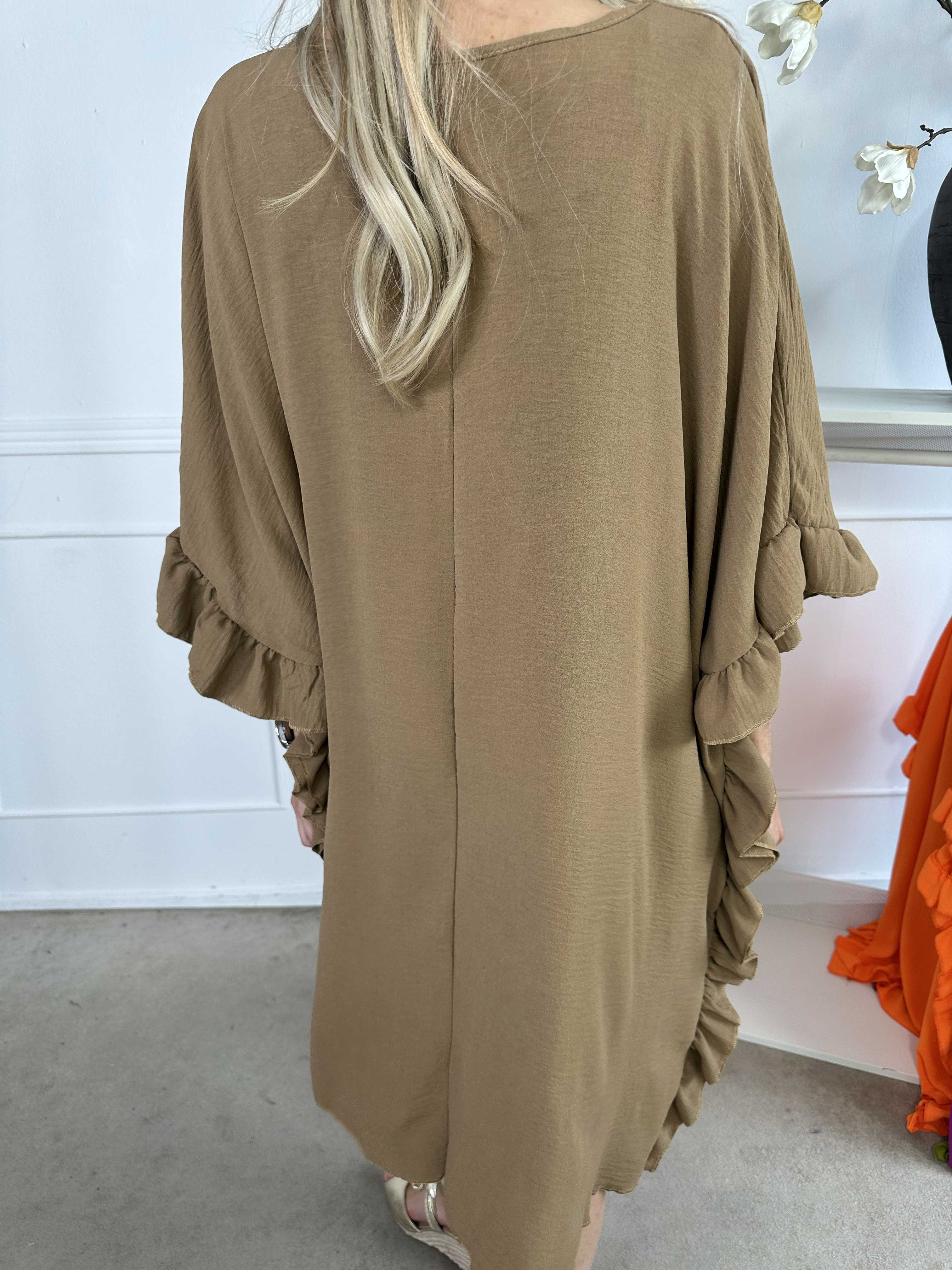 Cille - Söt tunika med volanger i sidorna